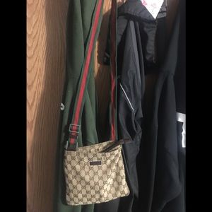 Gucci monogram cross body bag